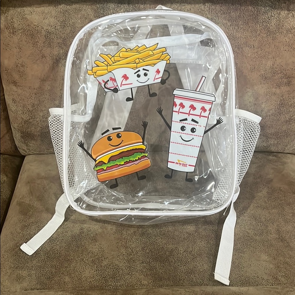 White Backpack with Clear Design and Colorful Accessories